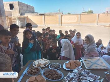 مراسم ساده دانش آموزان دبستان هویزه برای ام البنین
