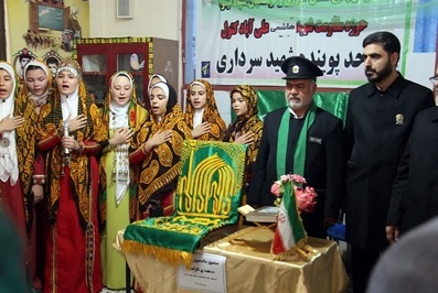حضور خدام رضوی به همراه پرچم متبرک آستان قدس در علی آبادکتول