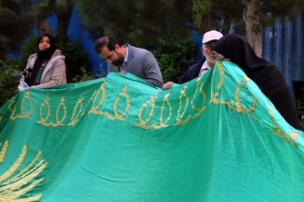 مراسم اهتزاز پرچم رضوی بر فراز همدان