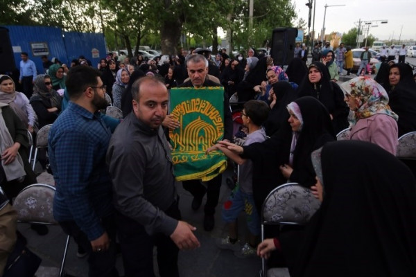 مراسم اهتزاز پرچم رضوی بر فراز همدان